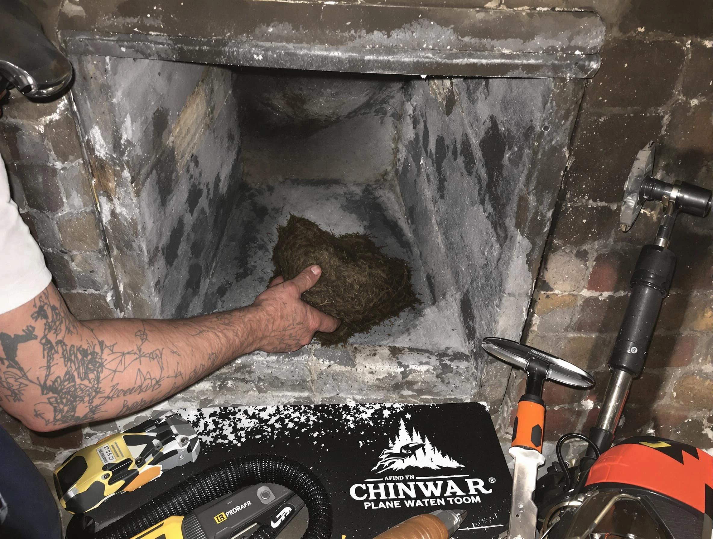 Gallatin Chimney Sweep safely removing debris and screening chimney in Gallatin, TN